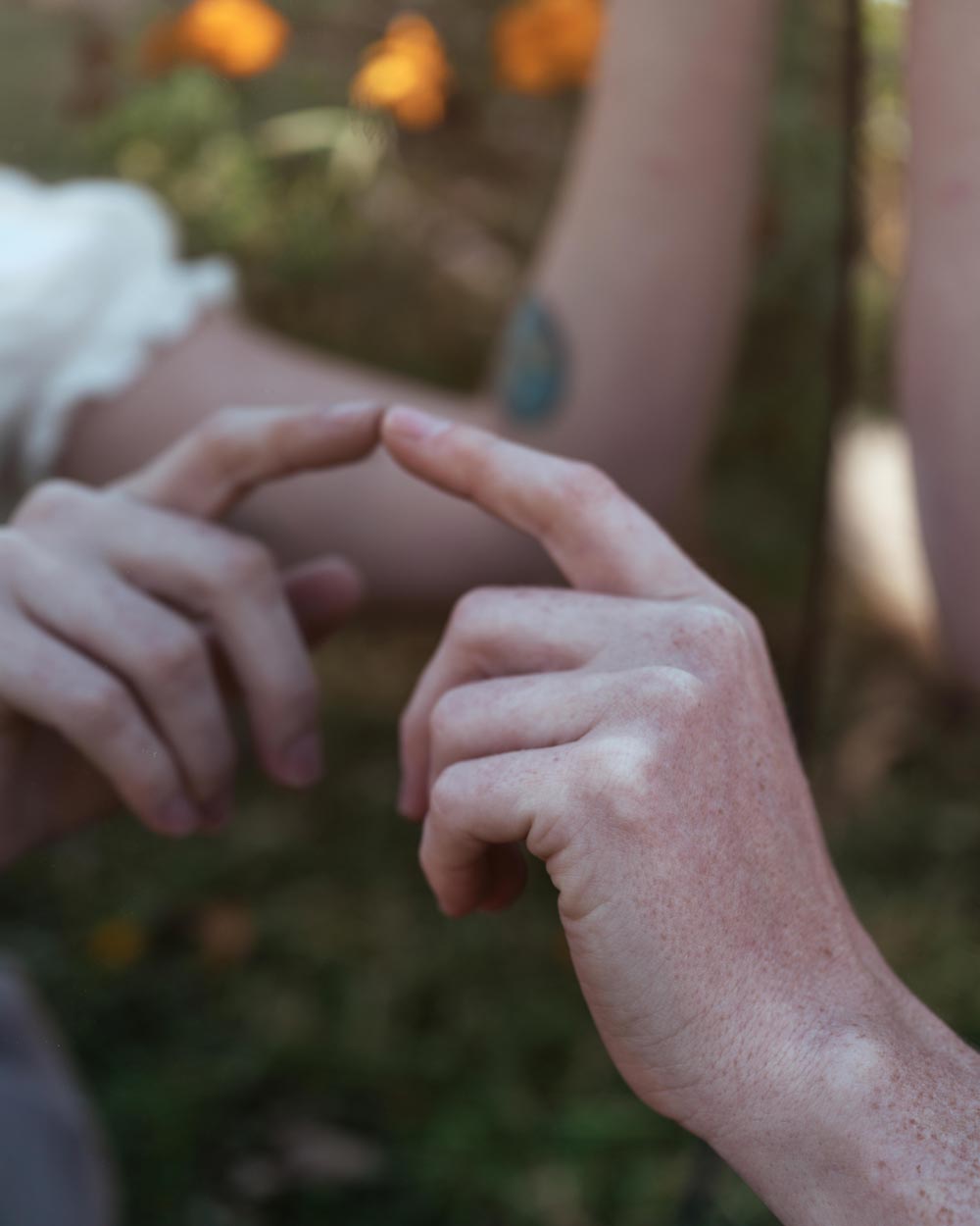 Couple touching fingers
